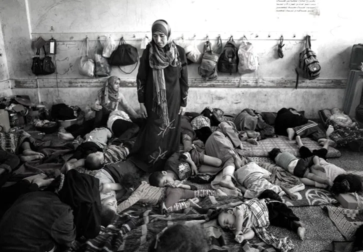 Gaza's orphans huddle together for warmth